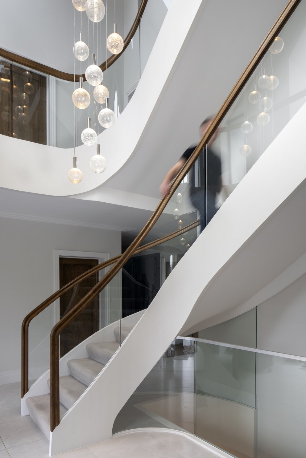 Hampshire famility residence | Staircase and chandelier | Interior Designers